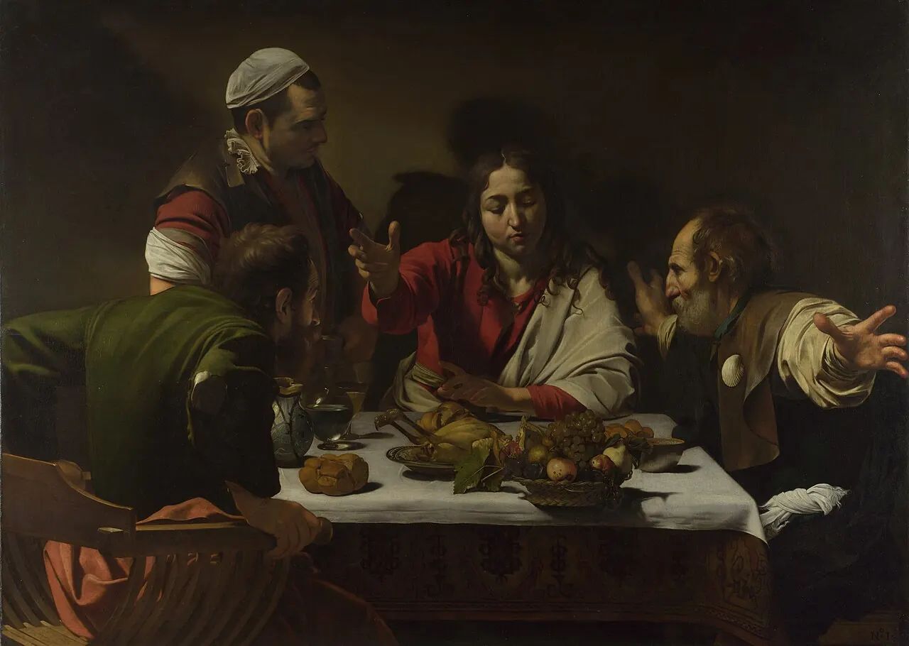 A Ceia em Emaús, de Caravaggio: Cristo abençoa o pão diante de dois discípulos surpresos.